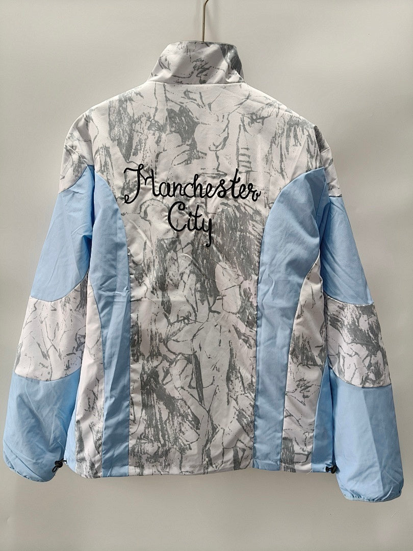 Casaco Manchester City F.C. Reversível 26/27
