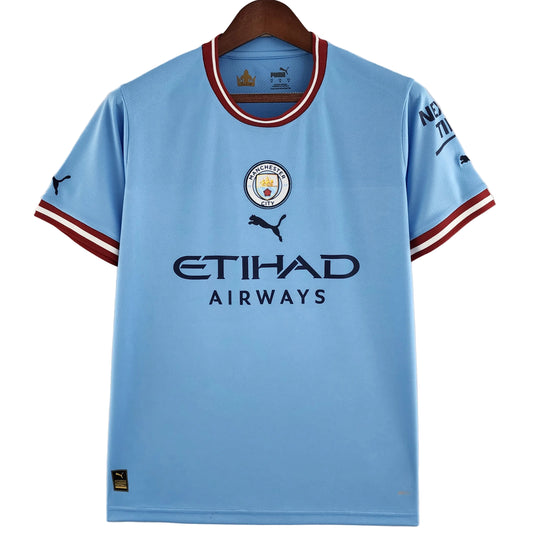 Camisola Retro Manchester City FC Principal 22/23