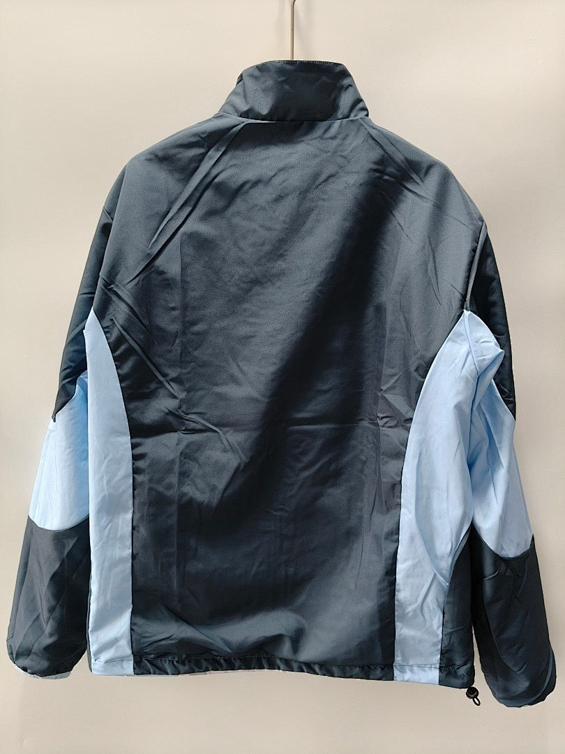 Casaco Manchester City F.C. Reversível 26/27